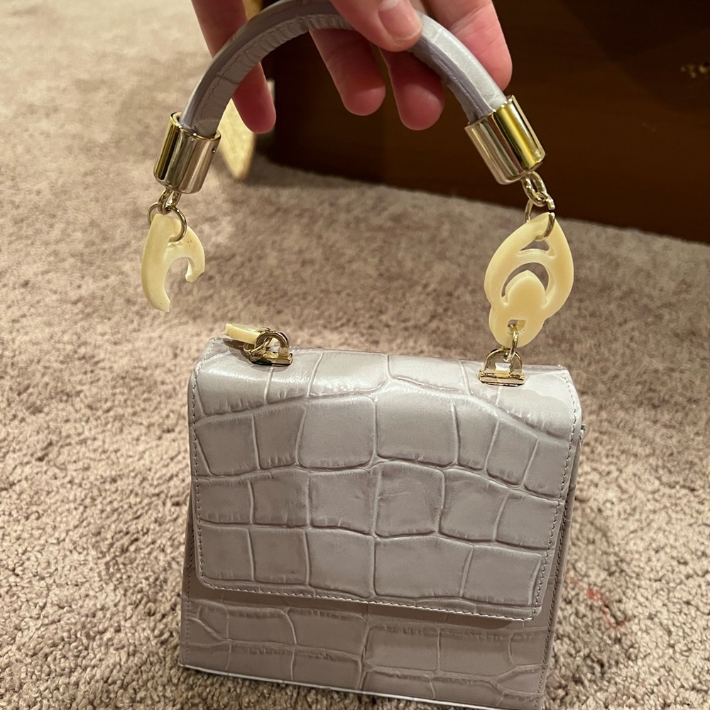 Nile Croc Embossed Leather Top Handle Bag
BROTHER VELLIES - Picture 8 of 8